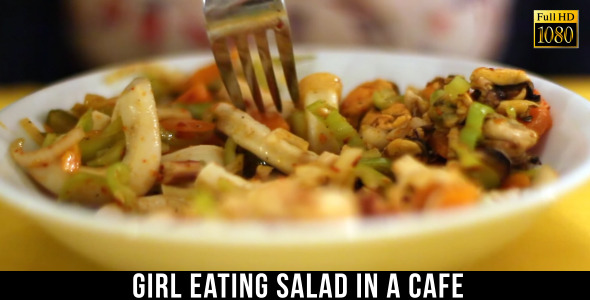 Girl Eating Salad In A Cafe 3
