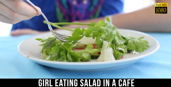 Girl Eating Salad In A Cafe 4