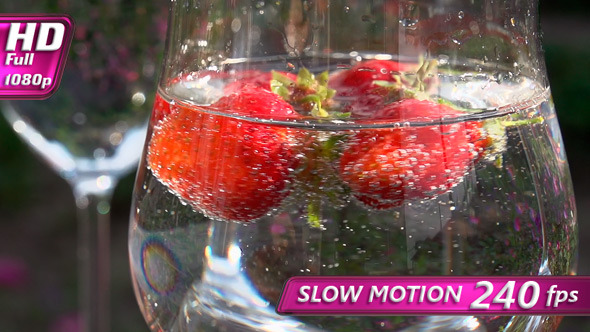 Strawberry Rotates in a Glass with Water