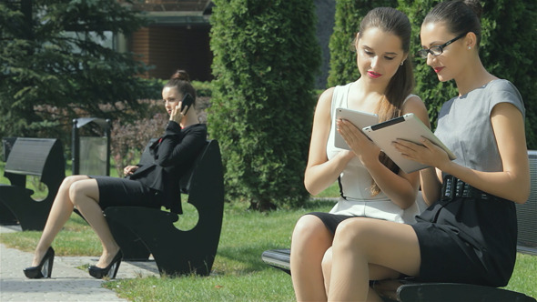 Business Couple Of Women Working