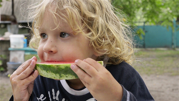 Boy Eating Watermelon