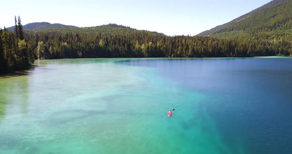 Aerial view of woman kayaking on a lake