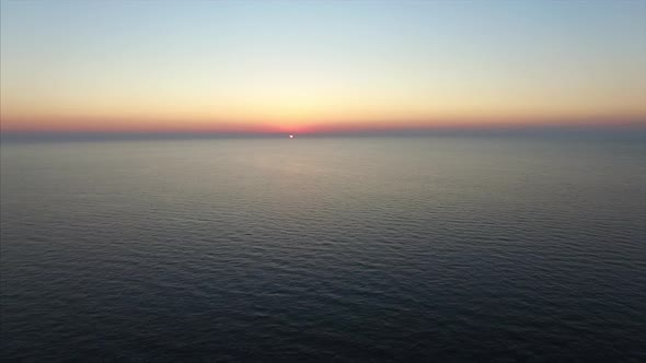 Wide Shot of Horizon on a Lake at Sunset