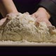 Hands of Baker Kneading Dough Isolated on Black Background - VideoHive Item for Sale