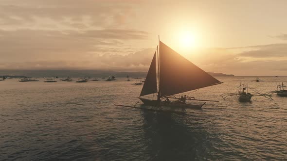 Yacht Silhouette at Sunset Seascape Aerial