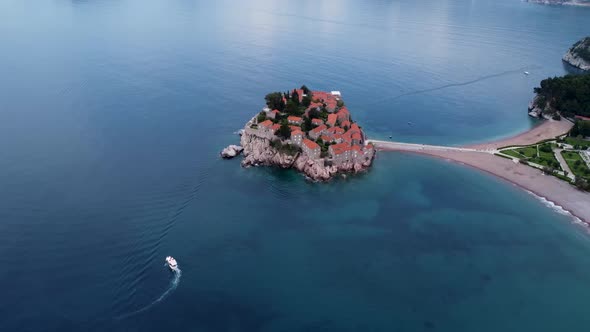 Drone footage of the famous Sveti Stefan island located in Budva in Montenegro. The island is seen o