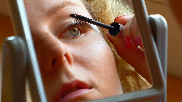 Woman Applying Mascara