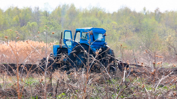 Tractor Plowing in Spring