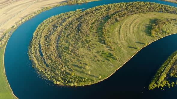 Green Landscape Aerial View Green Forest Woods And Curved River Landscape In Sunny Spring Day