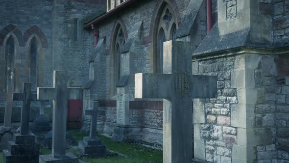 Tombstones By Church Moving Shot