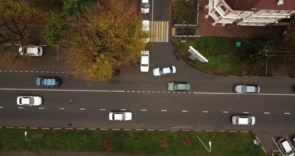 Top Down Drone Point of View - Steet City Road Intersection in Autumn Time