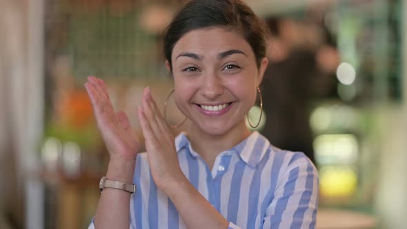 Excited Young Indian Woman Clapping 