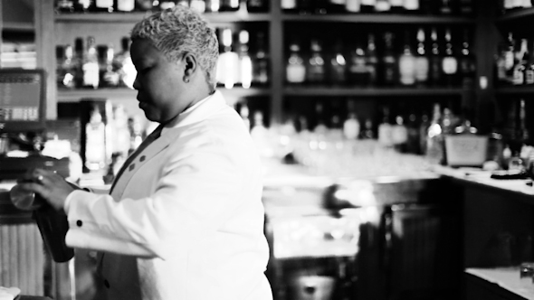 Female Cocktail Waiter In A Classic Looking Cocktail Bar Bartender alt