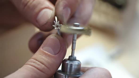 Jeweler Using Polishing Tool