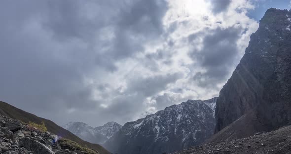 Timelapse of Epic Clouds in Mountain Valley at Summer or Autumn Time, Wild Endless Nature and Snow