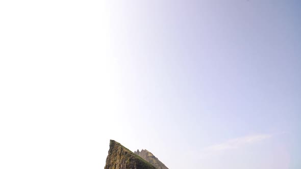 Rock Outcrop In Sea With Natural Arch