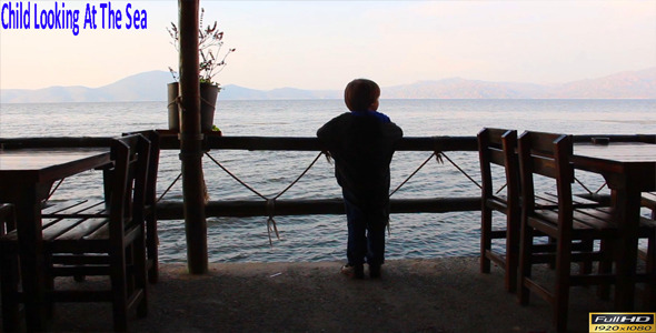 Child Looking At The Sea
