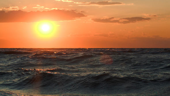 Golden Sunset Over Rough Sea