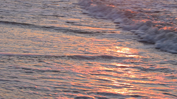 Sea Waves and Sunny Reflections 