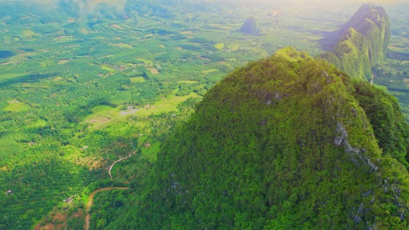 A drone is flying over "Khao Thalu"