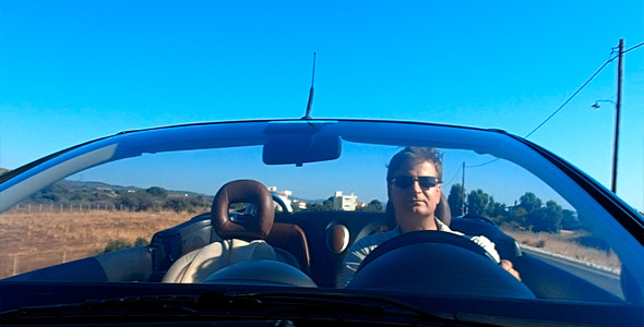 Man Driving With Open Top