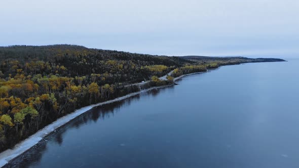 Drone flies along Lake Superior, Alona Bay, Great Lakes, Ontario, Canada