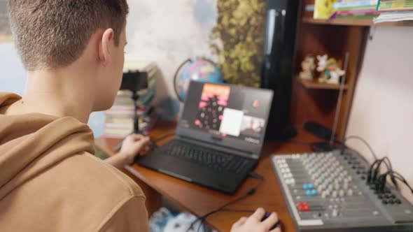 Boy Sitting at the Computer