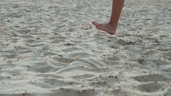 Active Sporty Barefoot Woman Runs on a Sand Beach in SLOW MOTION. Woman Fitness, Jogging Training