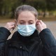 Young Woman Takes Off Medical Mask - VideoHive Item for Sale