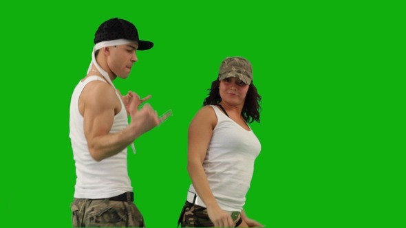 A Girl and a Guy Dancing Hip-Hop Battle