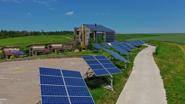 Building with solar panels in nature