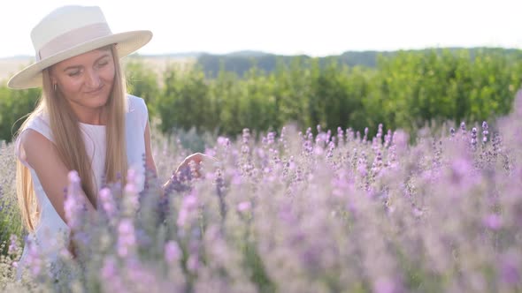 Girl Sitting in a Lavender Flower Field