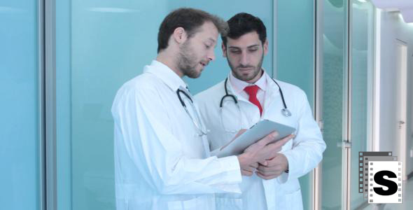 Doctors Using Tablet 