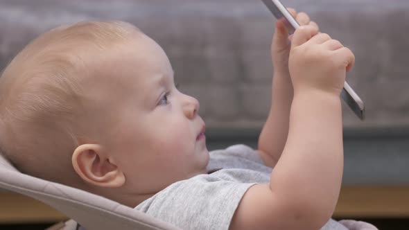 Child Having Fun Using Mobile Device 9Monthold Baby Boy Watching Russian Childrens Animated