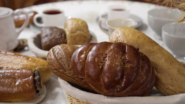 . Varieties Fresh Homemade Baked Breads on Table