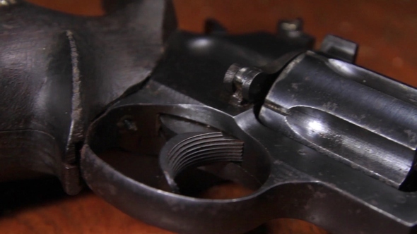 Revolver on a Table alt