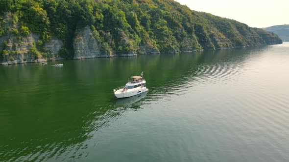 Aerial Shot Lonely Boat Near the Rocky Shore