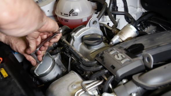 Car Repair Mounting the Oil Filter