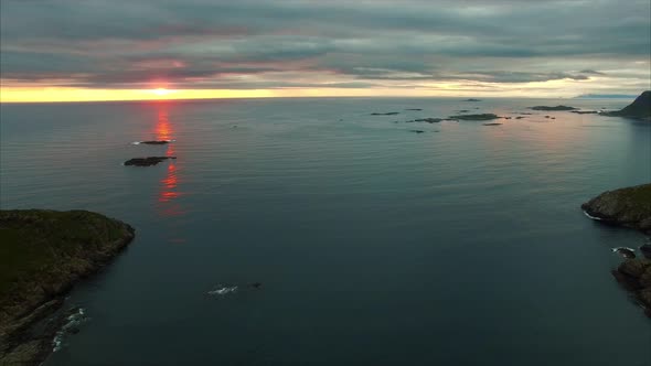 Midnight sun in arctic Norway, aerial footage.
