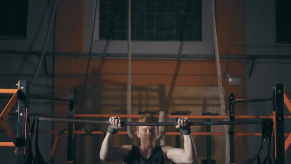 Young Man Doing Muscle Up Exercise