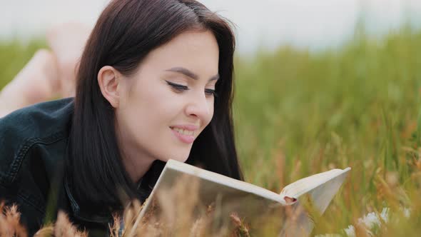 Close Up Portrait of Intellectual Woman Reads Interesting Novel Book Bestseller Romantic Literature