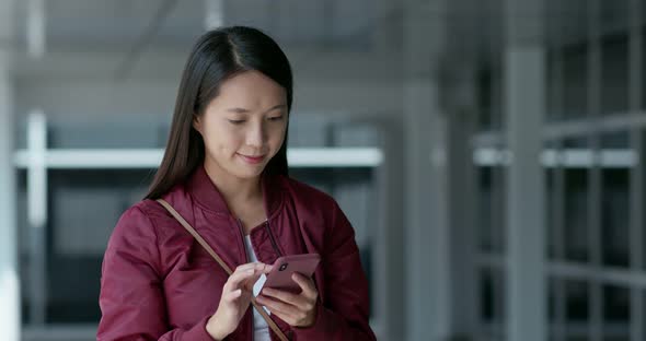 Woman check on smart phone at outdoor