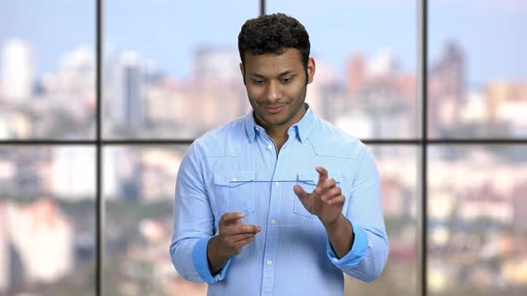 Handsome Businessman Working on Glass Tablet