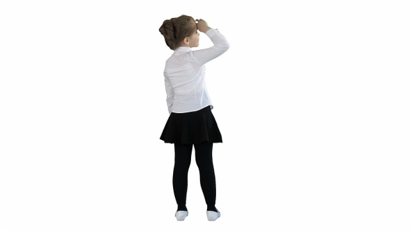 Little girl looking away on white background.