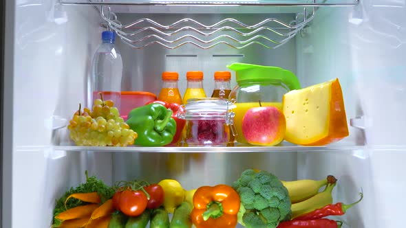 Open Refrigerator Filled with Food