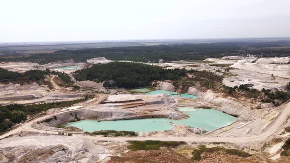 Aerial View Quarry Extraction Porcelain Clay Kaolin with Turquoise Water and White Shor