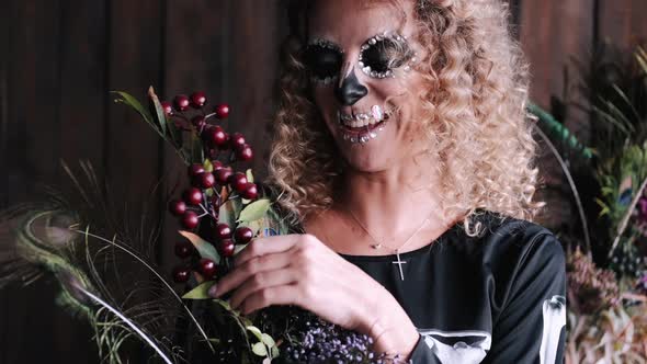 Portrait of Woman with Curly Hair and Extraordinary Makeup