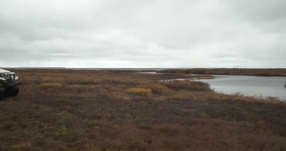 The Allterrain Vehicle Travels Through the Tundra to the Sea