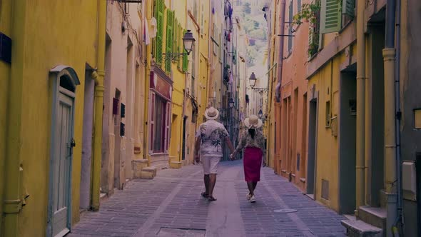 Menton France Colorful City View on Old Part of Menton ProvenceAlpesCote d'Azur France Couple on