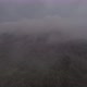 Aerial drone view of foggy mountains, forest and clouds. - VideoHive Item for Sale